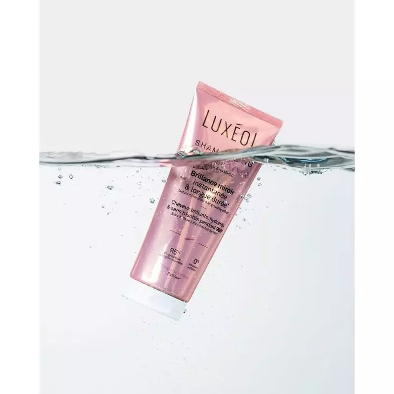 Trousse cadeau Luxéol Protocole Brillance avec pochette rose, flacons produits et étiquette 'SHAMPOO