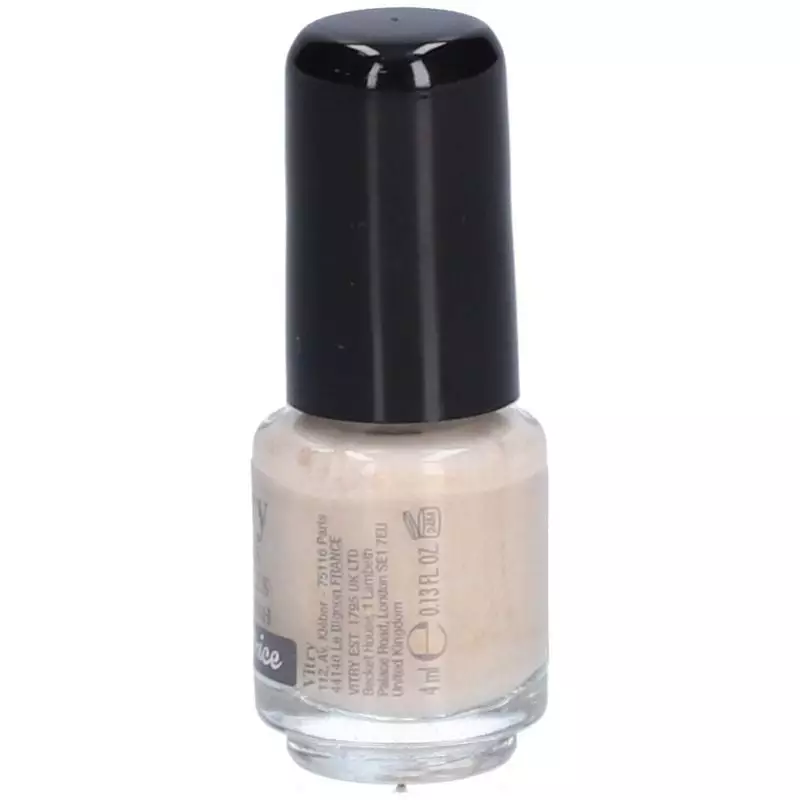 Vernis à ongles mini Vitry Impératrice à côté d'un doigt appliquant une couche éclatante, montrant u