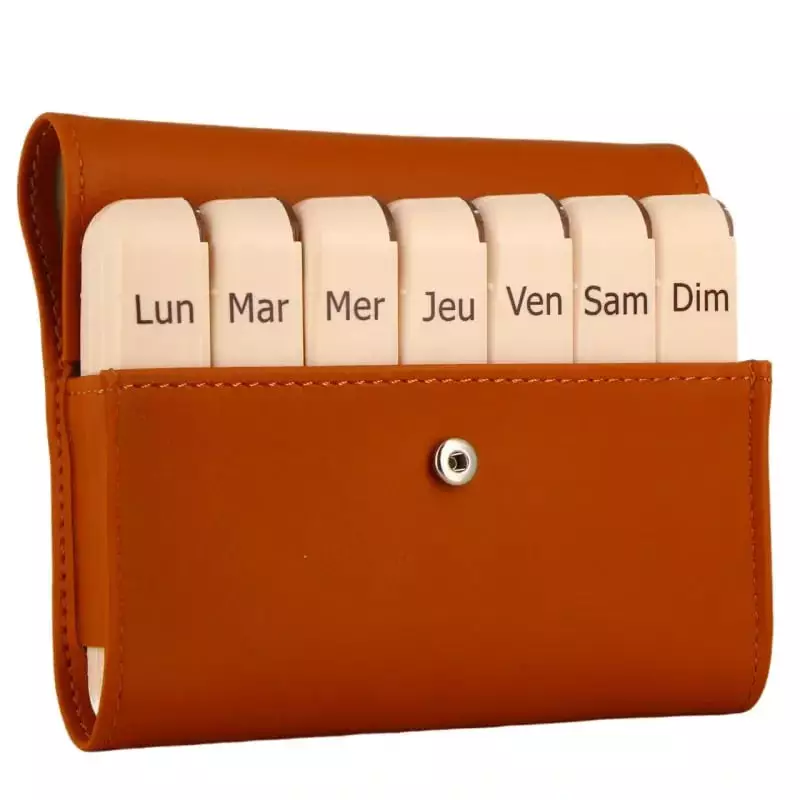 Vue latérale du pilulier Pilbox Liberty montrant l'épaisseur et les modules superposés.