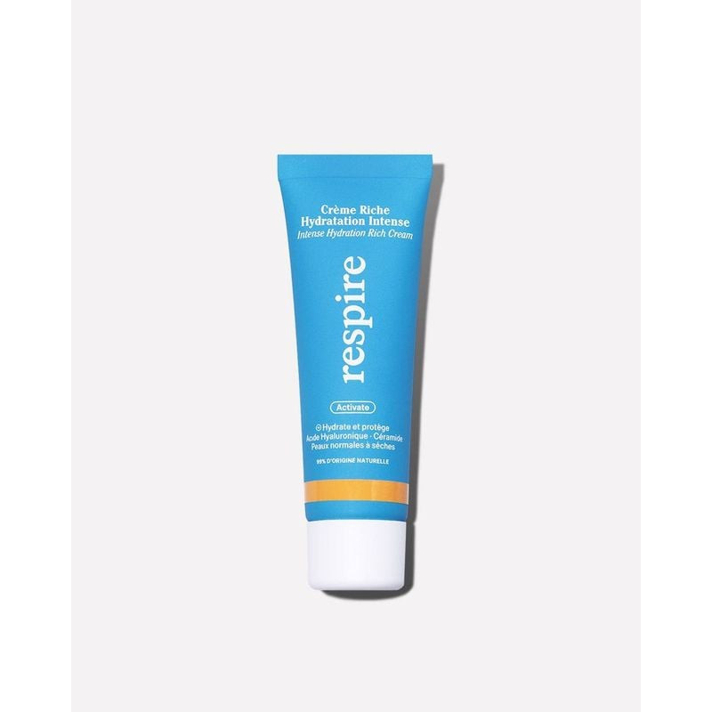 Pot de crème visage Respire La Crème Riche Hydratation Intense avec couvercle sur fond blanc.
