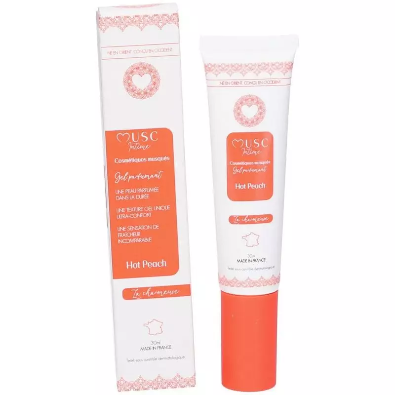 Packshot du gel parfumant intime Musc Intime Hot Peach montrant le flacon et l'emballage sur fond bl