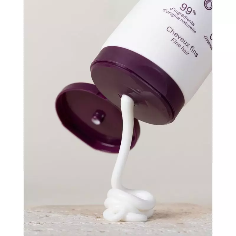 Gros plan sur le flacon Luxeol Après-Shampooing Épaississant sans silicone - 200ml, étiquette et tex