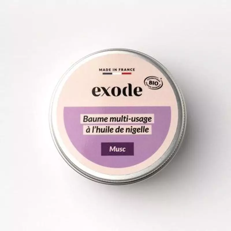 Vue de dessus de la boîte Exode Baume Multi-Usage Musc 50g, avec étiquette rose et violette détailla