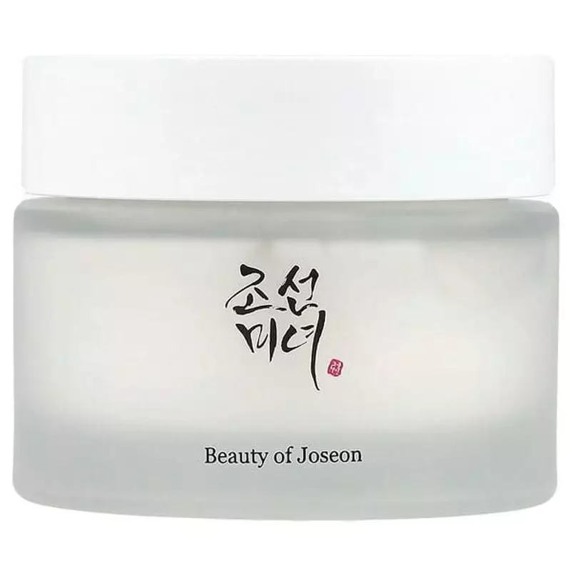 Gros plan sur l'emballage de la Crème Dynasty Beauty of Joseon : couvercle blanc, base de pot givré,