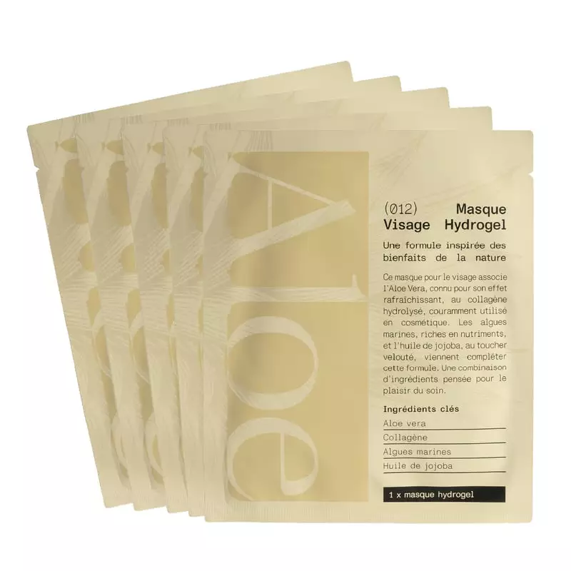 Gros plan sur le masque hydrogel Aloe Paris 945167 en emballage alu beige, étiqueté en français avec