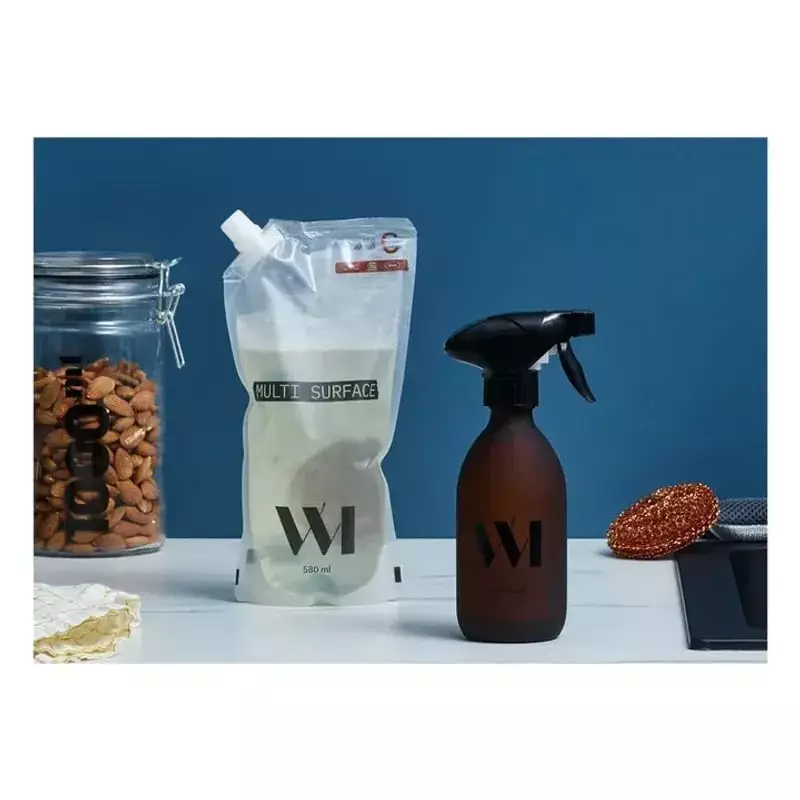 WhatMatters 1065126 recharge éco 500ml à la fleur d'oranger à côté du flacon pulvérisateur réutilisa