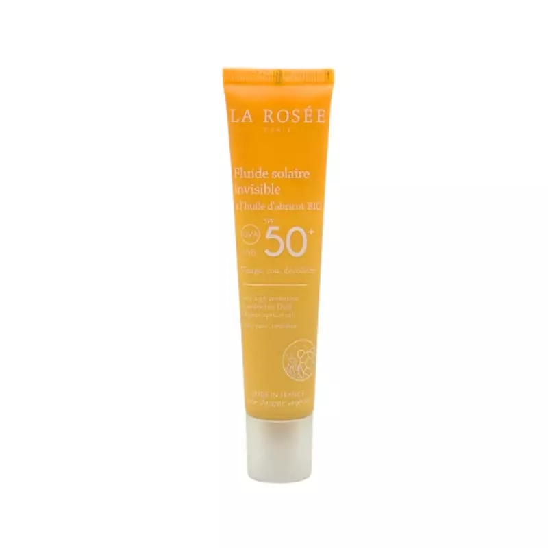 Vue avant du tube La Rosée Fluide Solaire Invisible SPF 50+ sur fond blanc, étiquette complète avec 
