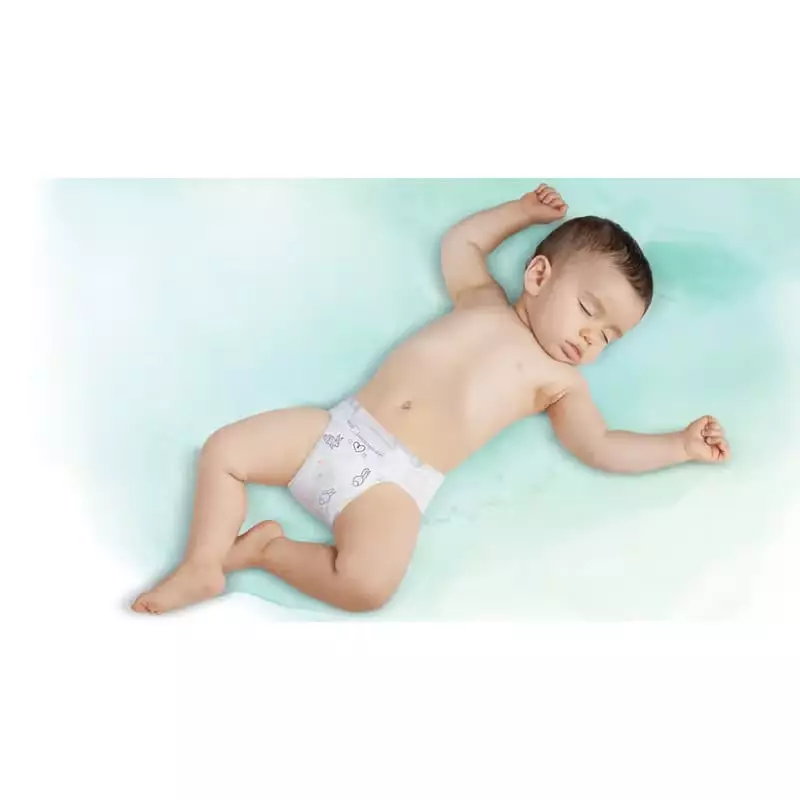 Pack Pampers Harmonie Maxi Taille 4 - Couches hypoallergéniques x 78 sur table à langer avec bébé he