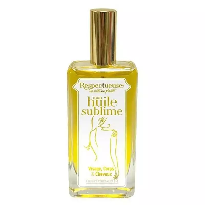 Respectueuse L’Huile Sublime flacon d’huile naturelle en vue inclinée, bouchon doré, verre transpare