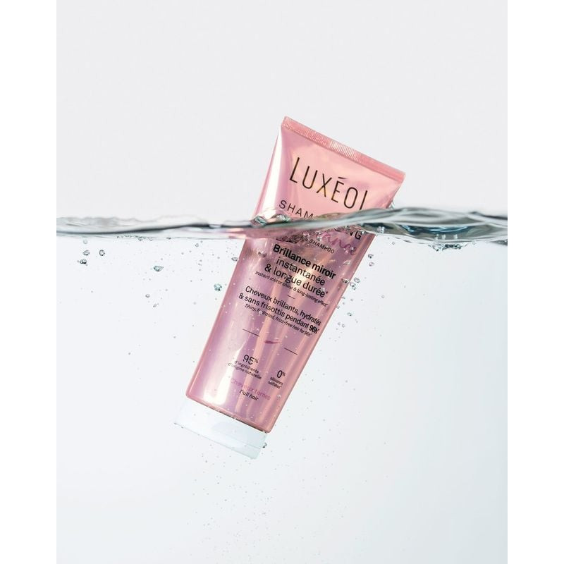 Trousse cadeau Luxéol Protocole Brillance avec pochette rose, flacons produits et étiquette 'SHAMPOO