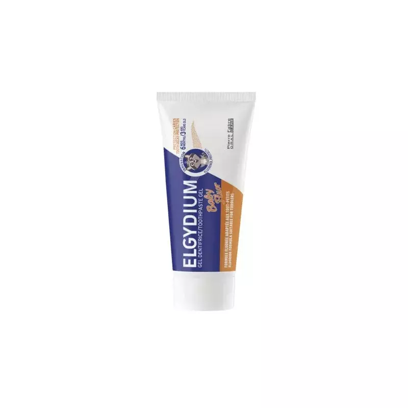 Tube de dentifrice gel ELGYDIUM Baby Fluor, vue de côté avec design bleu et orange, icône Raton lave