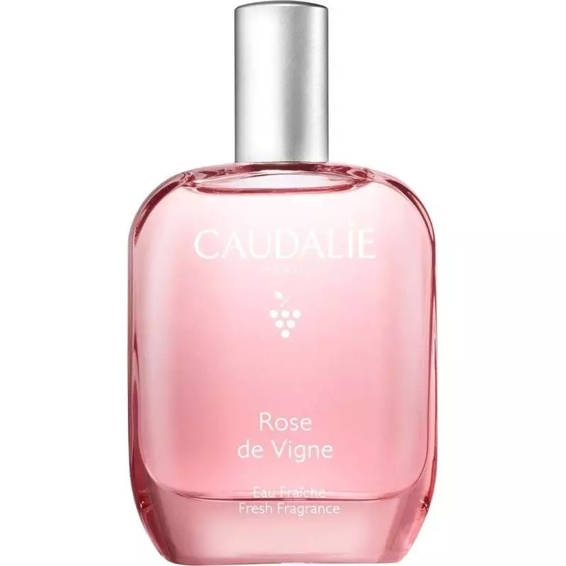 Flacon vaporisateur rose Caudalie L'Eau Fraîche Rose de Vigne vue de face droite sur fond blanc, met