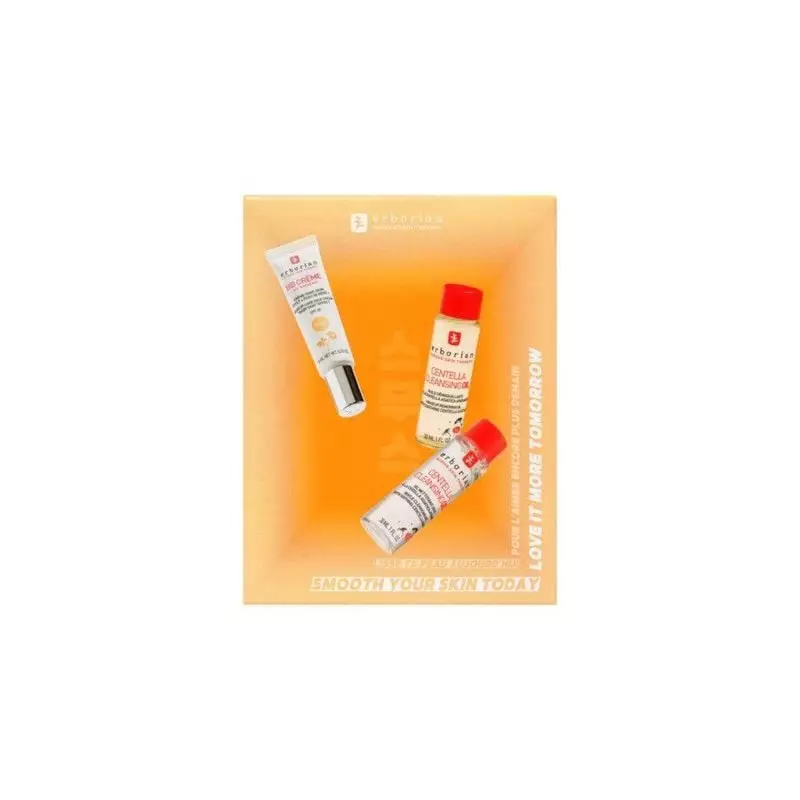 Kit beauté Erborian sur fond orange : tube BB Crème Ginseng Nude, flacon Huile Démaquillante Centell