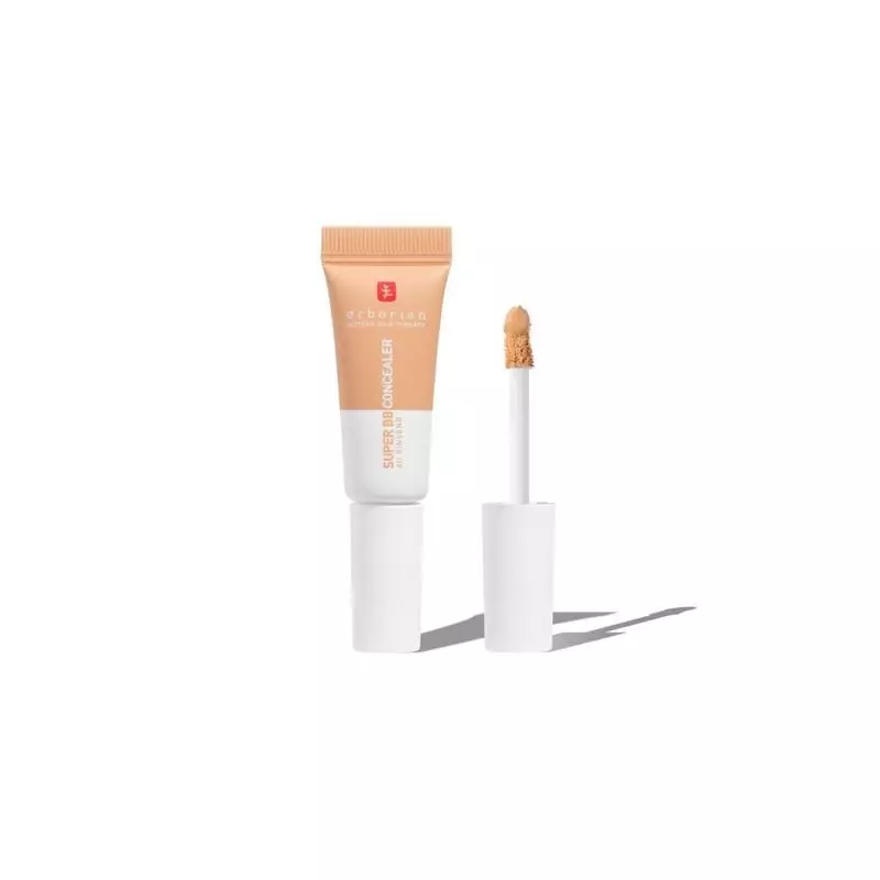 Tube Erborian CC Crème Doré et Super BB Concealer Doré à côté d'une boîte orange avec 'Love Your Ski