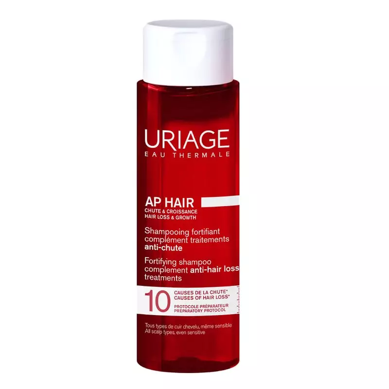 Flacon de shampooing fortifiant Uriage AP Hair, complément anti-chute des cheveux.
