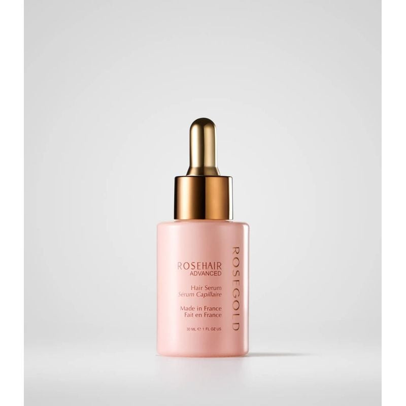 ROSEGOLD Paris ROSEHAIR Sérum capillaire avancé en flacon rose avec pipette dorée.