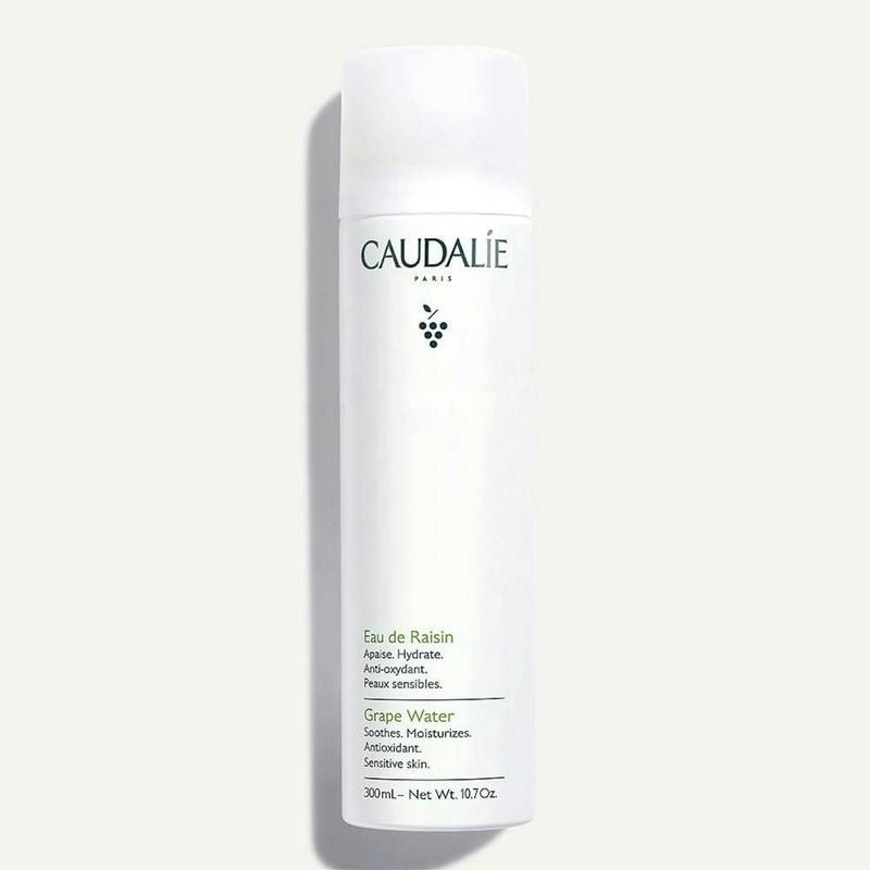 Flacon de brume hydratante visage Caudalie L'Eau de Raisin, 300 ml, packshot sur fond blanc.