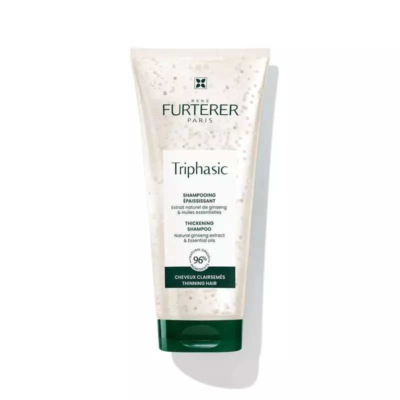 Packshot du flacon de shampooing épaississant René Furterer, mettant en valeur sa formule volumisant