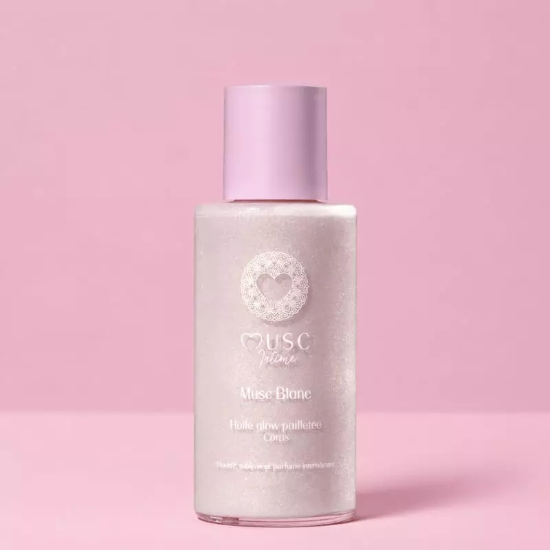 Packshot de l'Huile Glow Pailletée Musc Blanc de Musc Intime, une huile sèche pailletée au parfum de