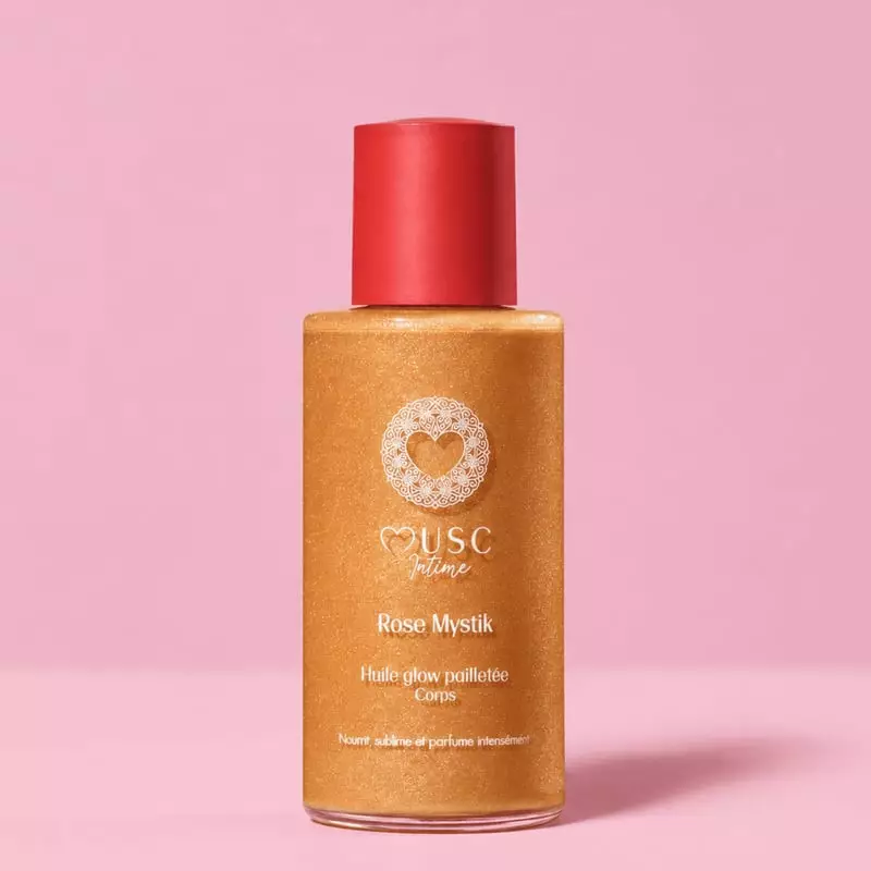 Flacon en verre de l'Huile Glow Pailletée Corps Rose Mystik de Musc Intime avec bouchon doré, vue de