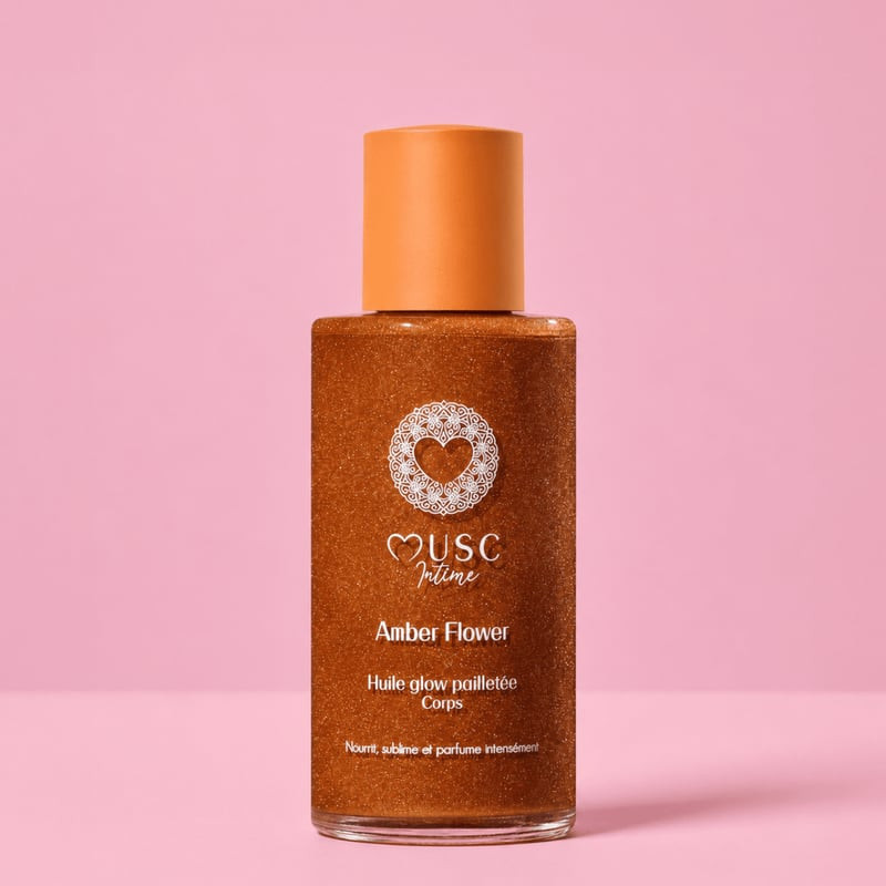 Packshot de l'Huile Glow Pailletée Corps Amber Flower 100ml de Musc Intime, avec bouchon doré et fla