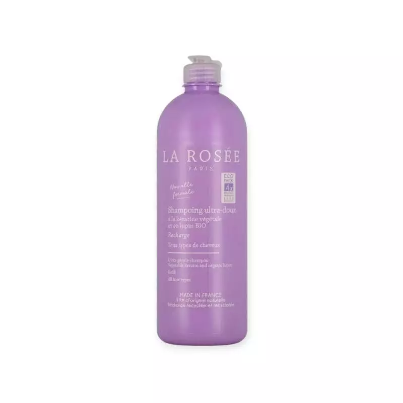 Flacon de shampoing La Rosée au design épuré, avec des ingrédients naturels pour un nettoyage doux.