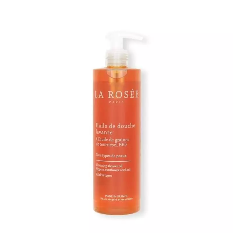 Huile de Douche Lavante La Rosée dans un flacon blanc avec étiquette verte, packshot sur fond clair.