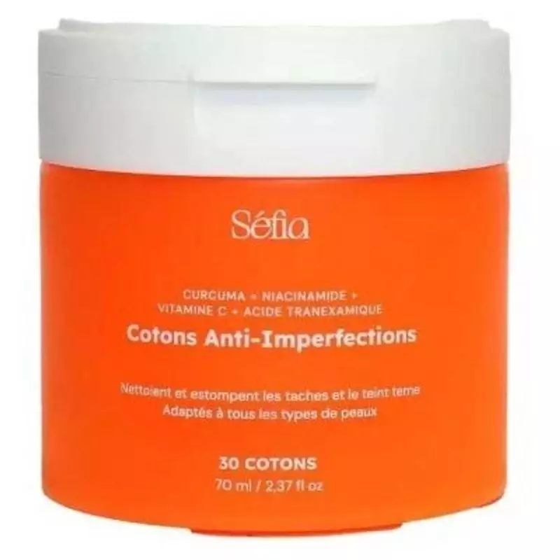 Packshot des Cotons au Curcuma Séfia anti-imperfections, emballage blanc.