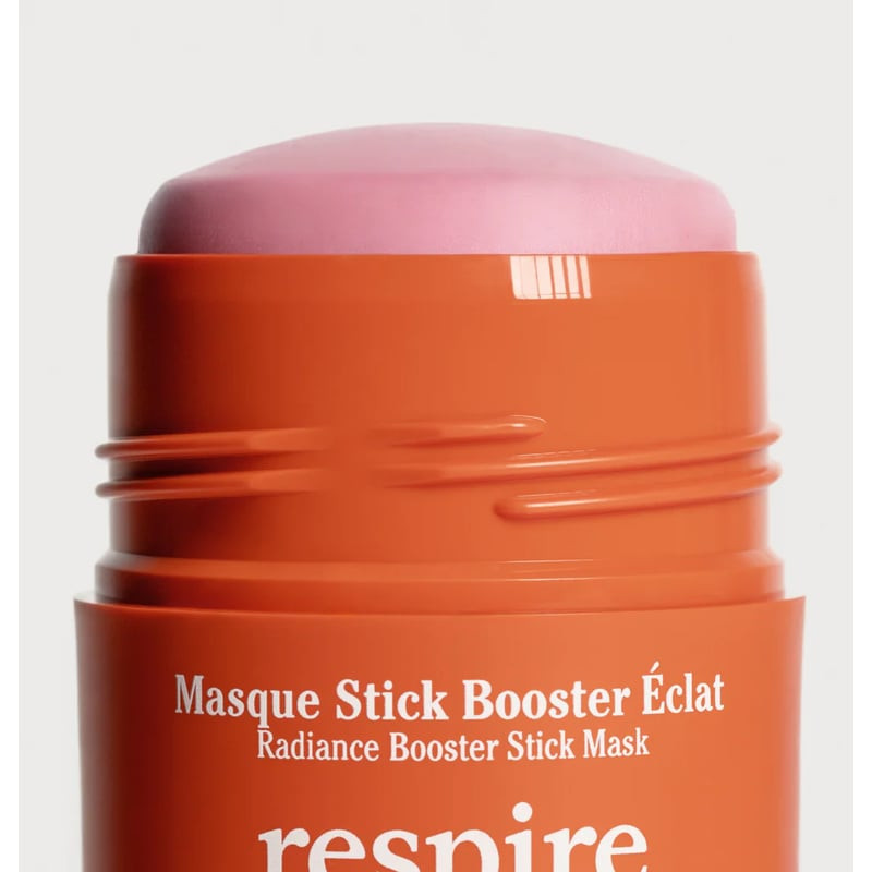 Vue de face du Masque Stick Booster Éclat Respire 50g avec texture d'argile rose