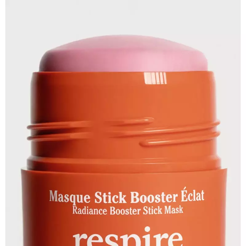 Vue de face du Masque Stick Booster Éclat Respire 50g avec texture d'argile rose