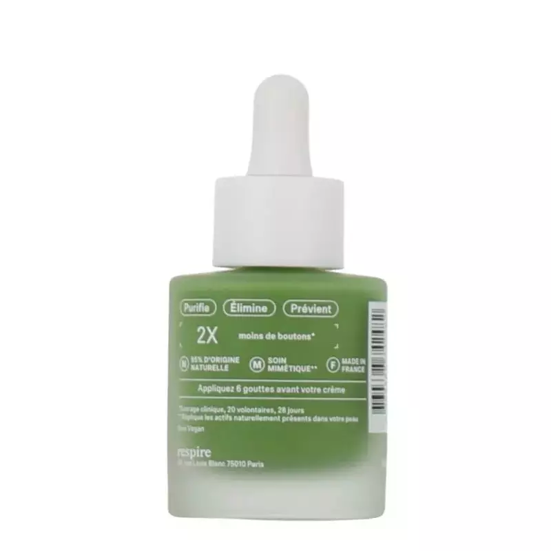Vue de face du flacon du Sérum Purifiant Respire avec son capuchon-pipette, mettant en avant le nom 