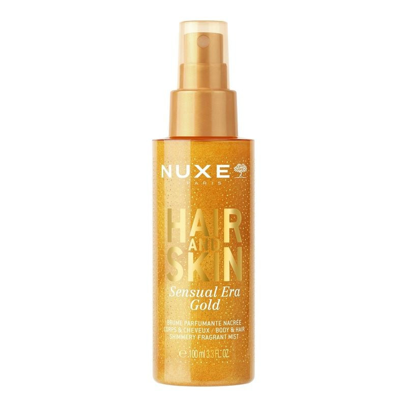 Flacon de brume parfumée corps et cheveux NUXE Sensual Era Gold avec liquide doré chatoyant.
