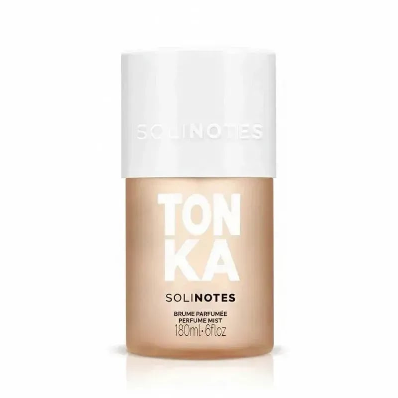 Brume parfumée Solinotes Tonka dans un flacon en verre transparent avec un capuchon noir, 180 ml.