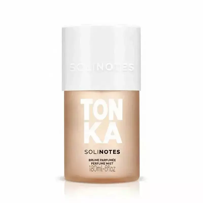 Brume parfumée Solinotes Tonka dans un flacon en verre transparent avec un capuchon noir, 180 ml.