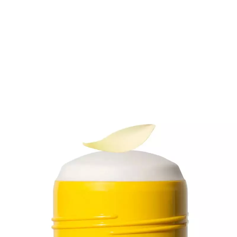 Gros plan du stick déodorant Respire 1985885 montrant la texture de crème blanche lisse et l'applica