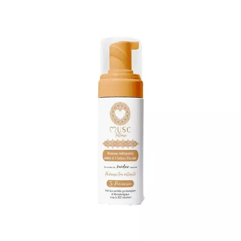 Packshot du produit Musc Intime Mousse Intime Ambre Rose 150ml, flacon pompe blanc et doré