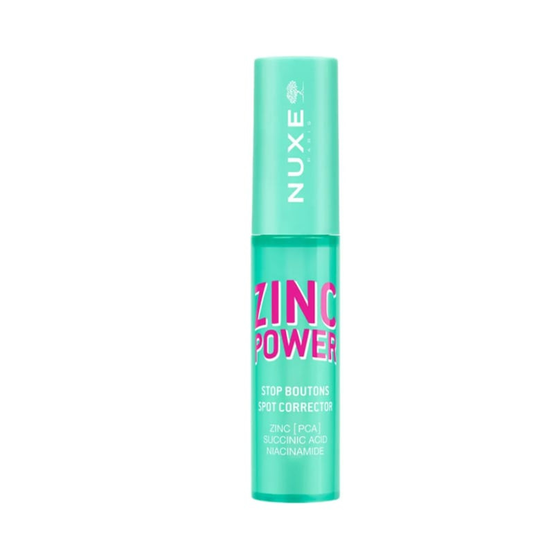 Packshot du tube correcteur NUXE Zinc Power Stop Boutons, logo et nom du produit visibles.
