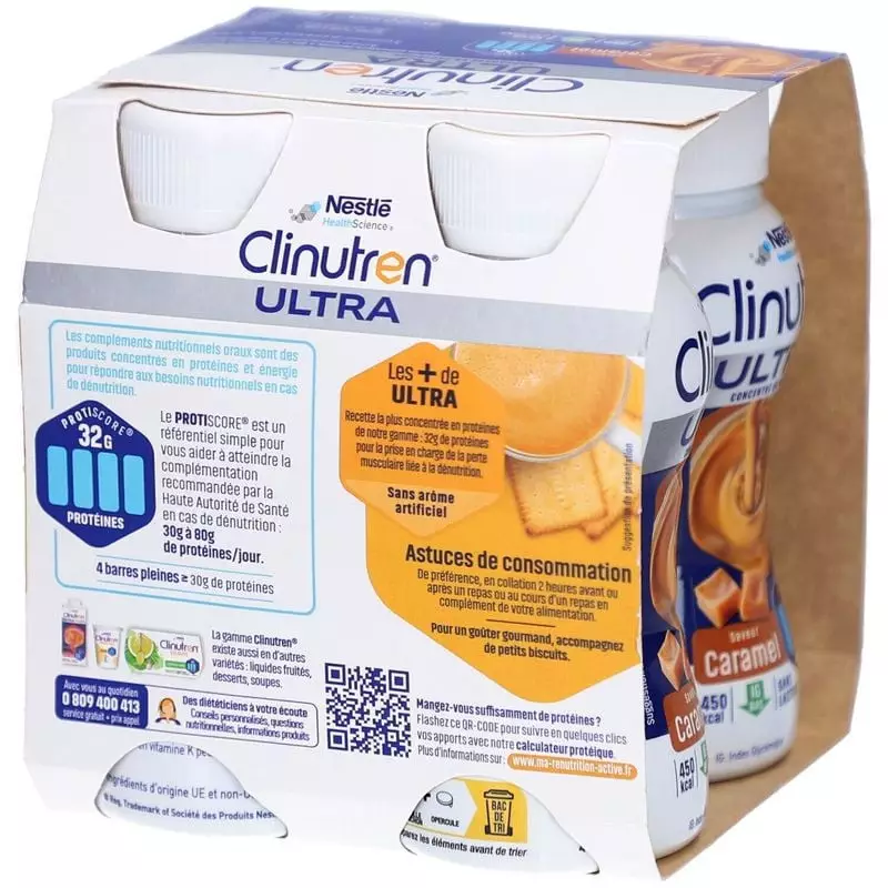 Bouteille de Clinutren Ultra Caramel 200 ml versée dans un verre avec un filet de caramel sur une su