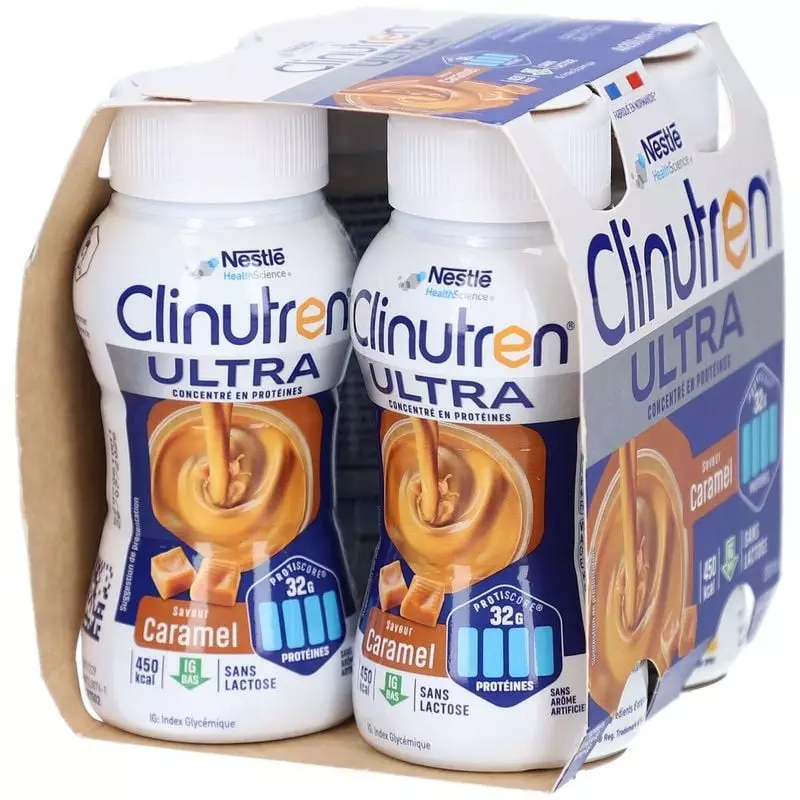 Bouteille Clinutren Ultra Caramel 200 ml sur plateau de petit-déjeuner avec croissant chaud et fruit