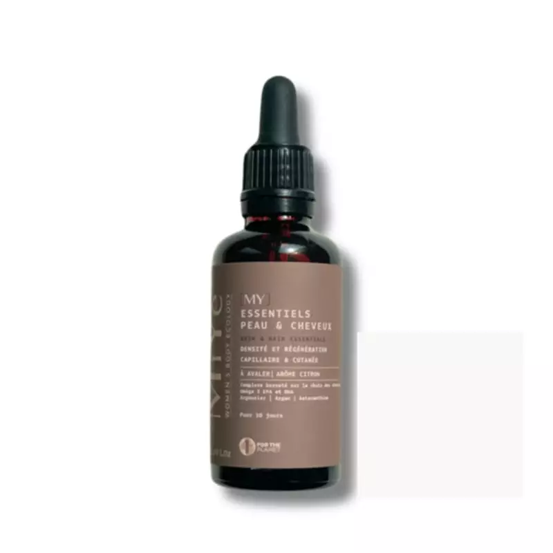 Huile MiYé Essentiels Peau et Cheveux au citron à ingérer, flacon élégant avec compte-gouttes.