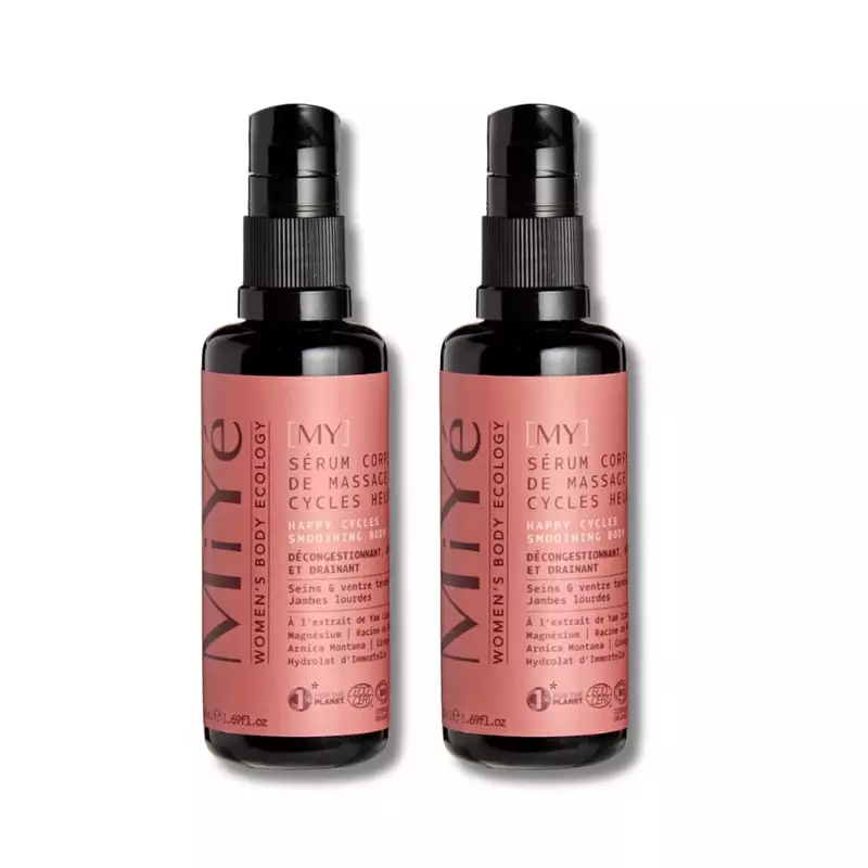 Sérum corporel MiYé Cycles Heureux dans un flacon blanc à étiquette rose, sur fond rose pâle