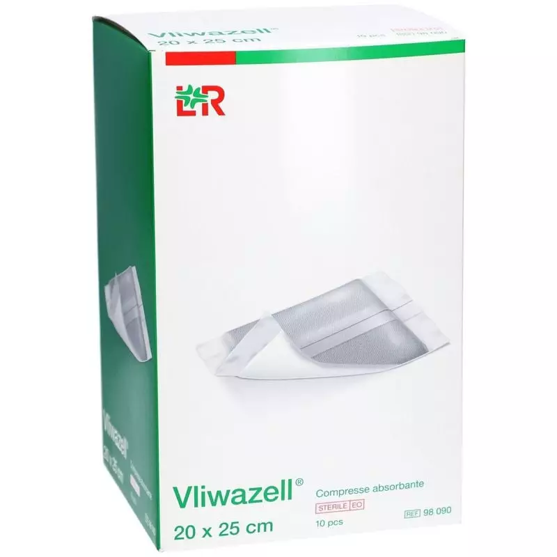 Pansement Vliwazell sur une surface plane, avec comparaison de taille et sachet stérile à ouverture 