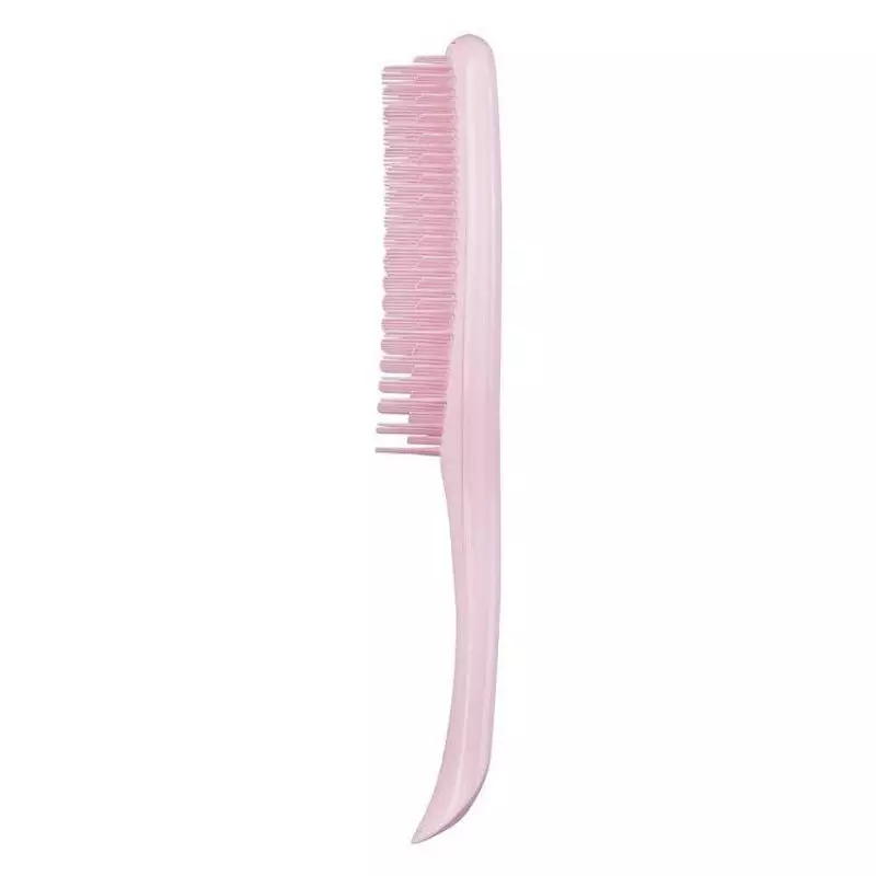 Vue de profil de la brosse Tangle Teezer rose millennial, mettant en valeur ses picots flexibles et 