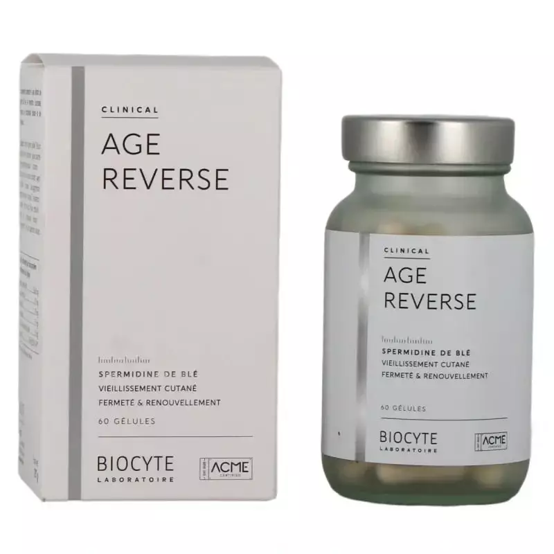 Boîte et flacon en verre de Biocyte Clinical Age Reverse 60 gélules avec bouchon argenté sur fond bl