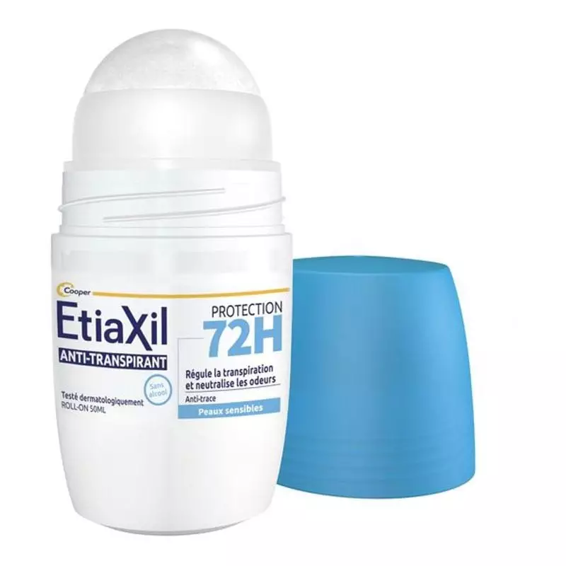 Flacon Etiaxil anti-transpirant roll-on 72H 50 ml ouvert, bille applicateur visible à côté du boucho