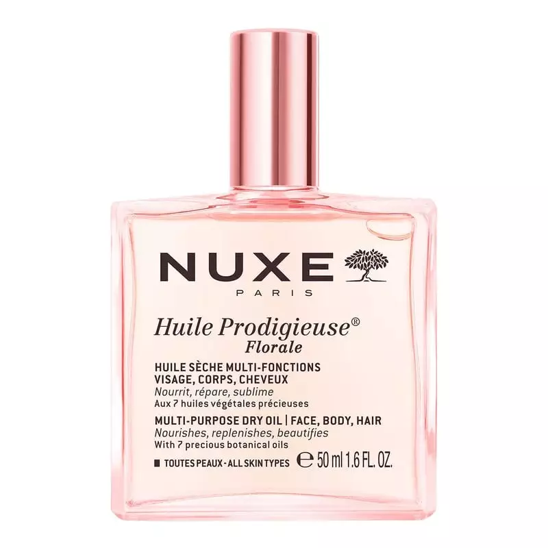 Flacon carré transparent Nuxe Huile Prodigieuse Florale 50 ml, bouchon or rose et huile sèche floral