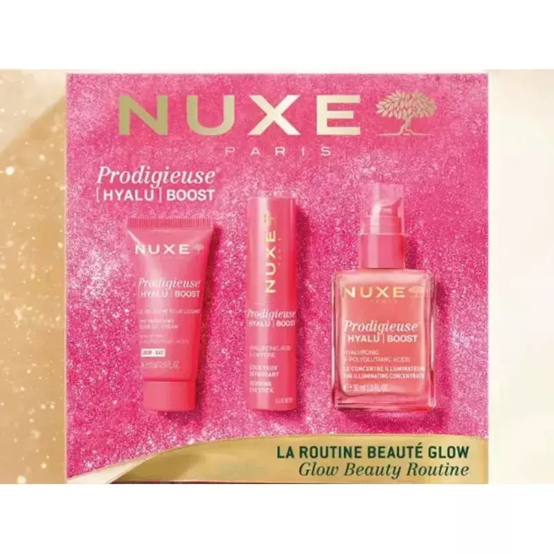 Coffret Nuxe La routine beauté glow à plat sur fond doré et rose avec trois soins Prodigieuse Hyalu 