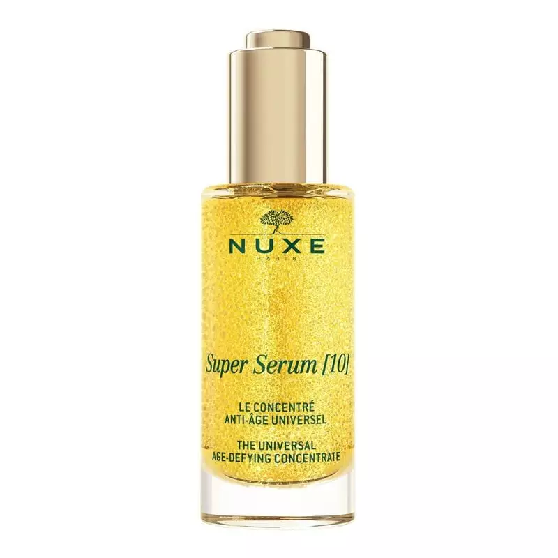 Flacon en verre Nuxe Super Sérum [10] Longevity 50 ml avec bouchon doré et pipette, sur fond blanc