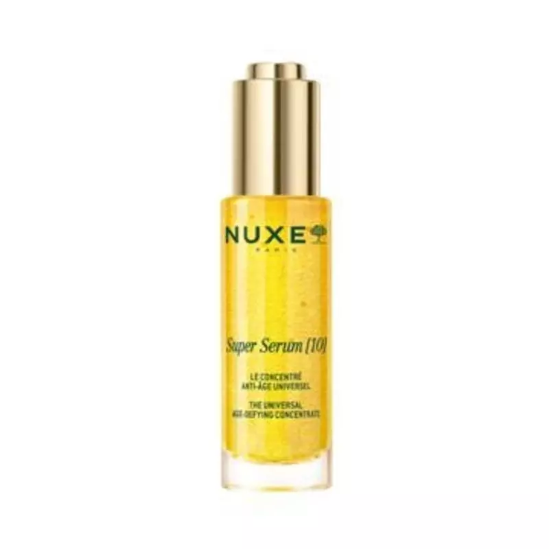 Flacon en verre transparent Nuxe Super Sérum Longévité 30 ml, bouchon doré et sérum anti-âge jaune d