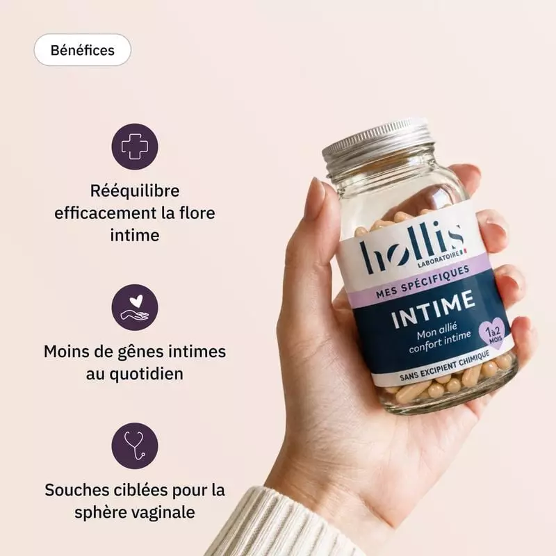 Main tenant le pot Hollis Intime près d’icônes d’équilibre et de confort de la flore intime